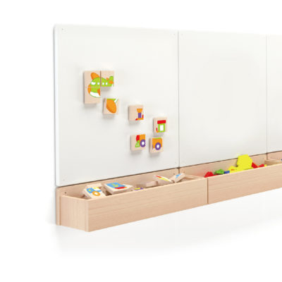 magnetic white board showing magnetic wooden transport themed puzzle tiles