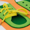 wall mount dressing activity board with shoe lace tying