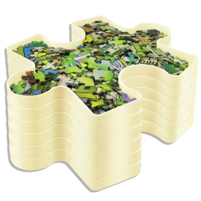 stacked puzzle storting trays with puzzle pieces