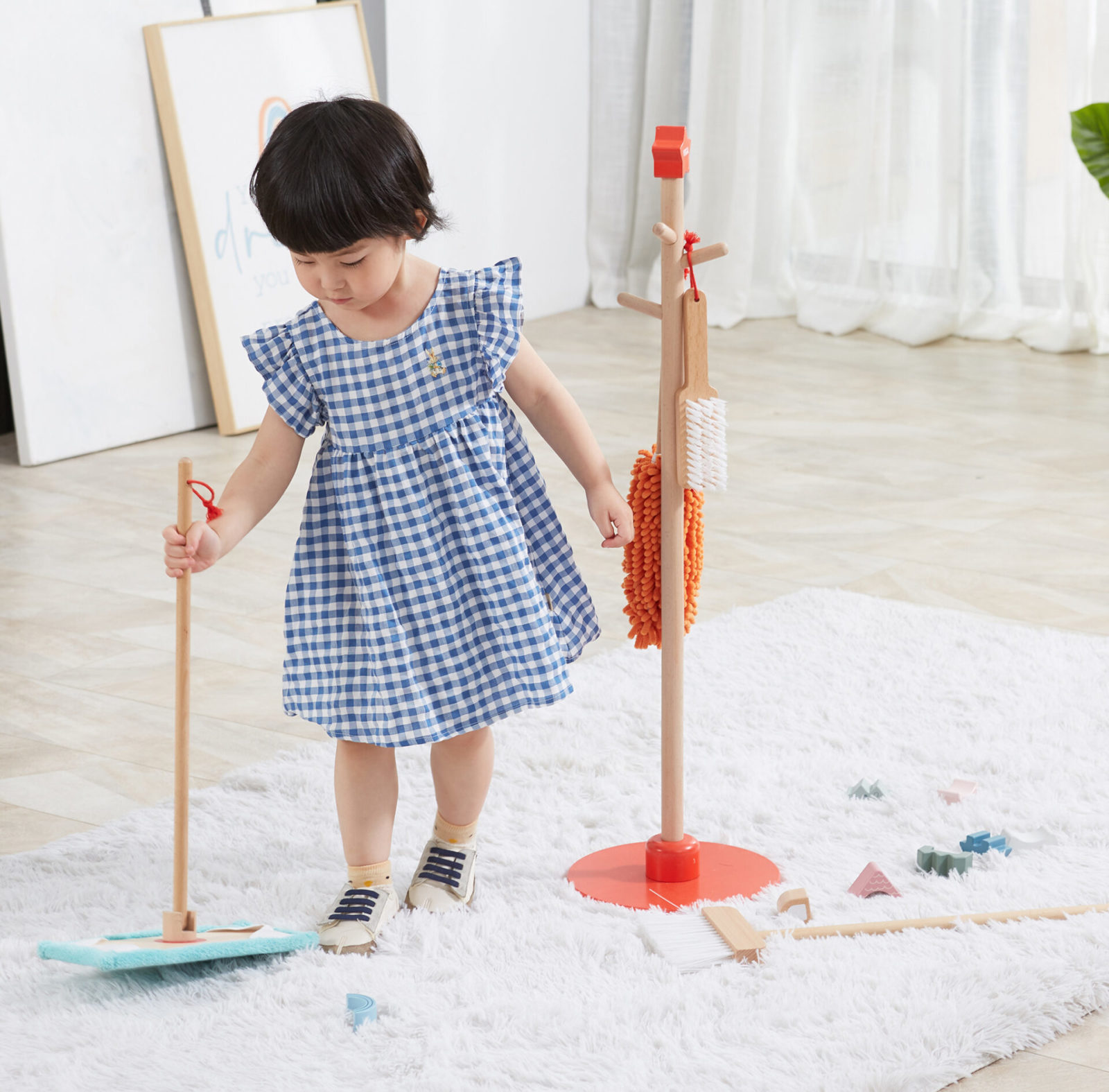 Child playing with Cleaning Tools Set